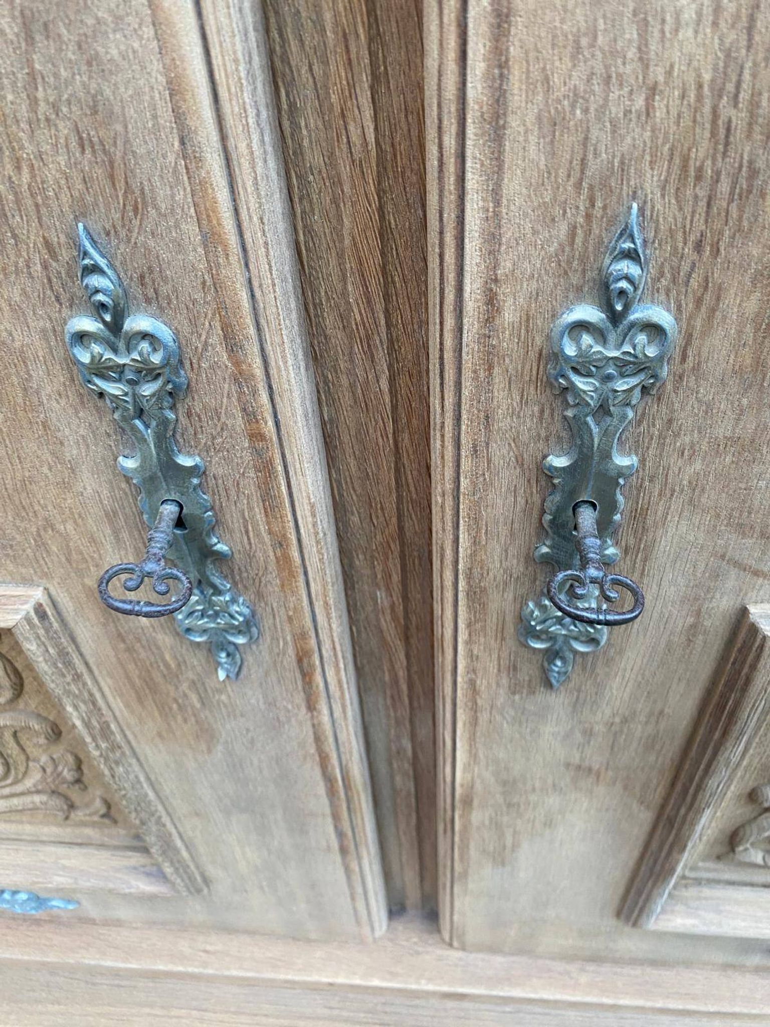 Renovated Spanish Renaissance oak buffet armoire from the 1930s.