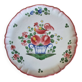 Antique pie dish in St Clément faience with a basket hen motif.