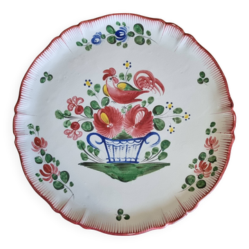 Antique pie dish in St Clément faience with a basket hen motif.
