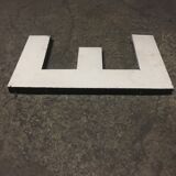 Letter e in old zinc