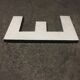 Letter e in old zinc