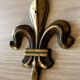 Brass fleur-de-lis