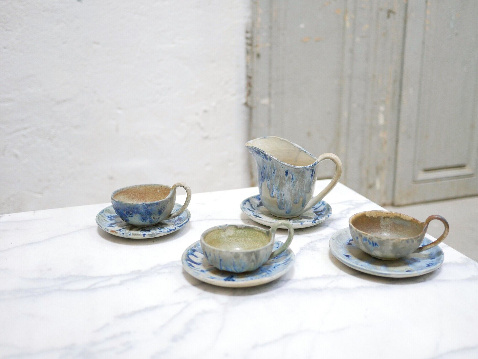 Series of 3 cups, a milk jar and 4 antique porcelain saucers