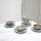 Series of 3 cups, a milk jar and 4 antique porcelain saucers