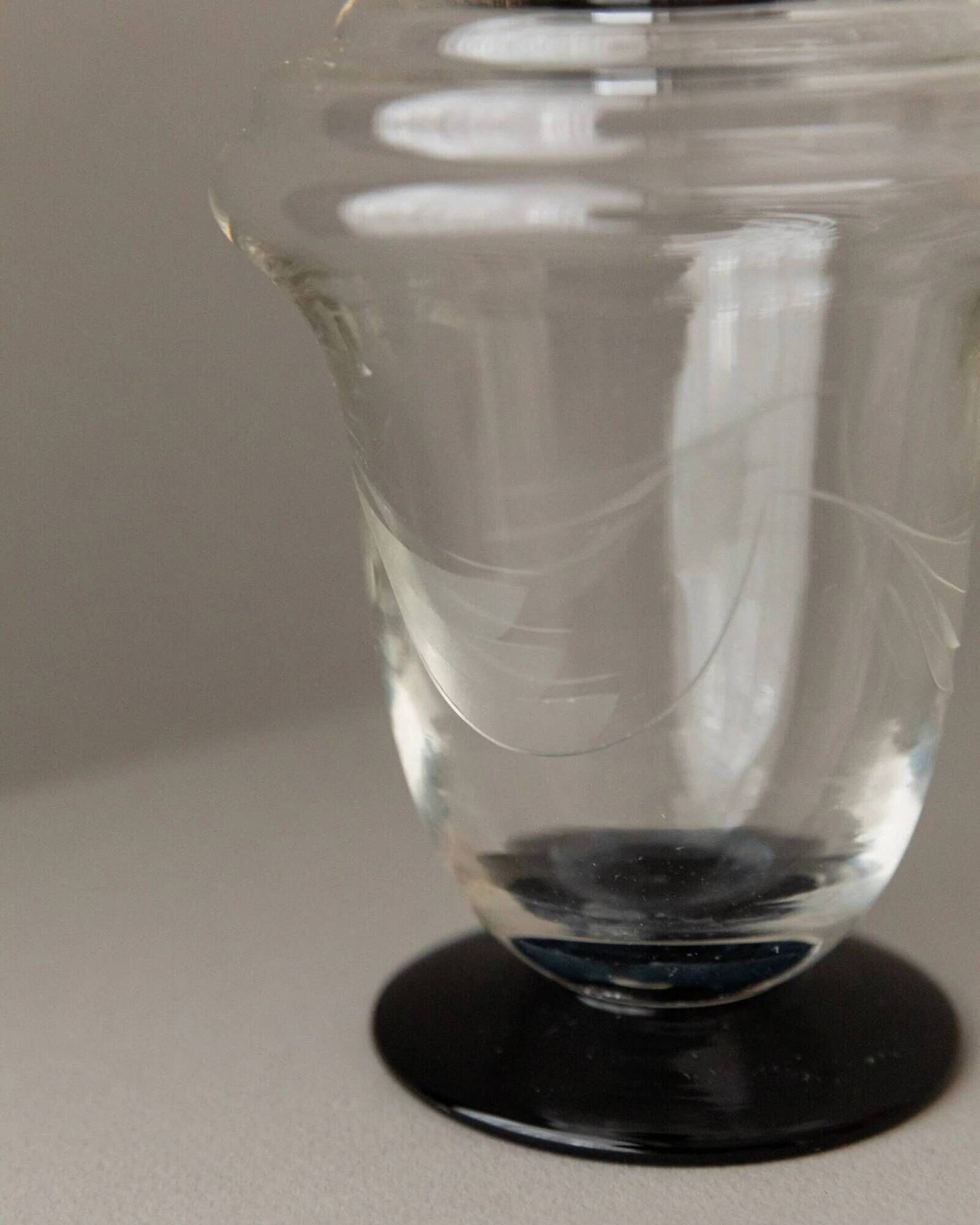 Transparent Murano glass decanter with black stopper and silver neck collar, Art Deco, 1930s Italy