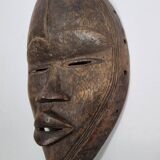 Dan mask in carved wood, brown patina, Ivory Coast, 25 cm