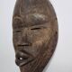 Dan mask in carved wood, brown patina, Ivory Coast, 25 cm
