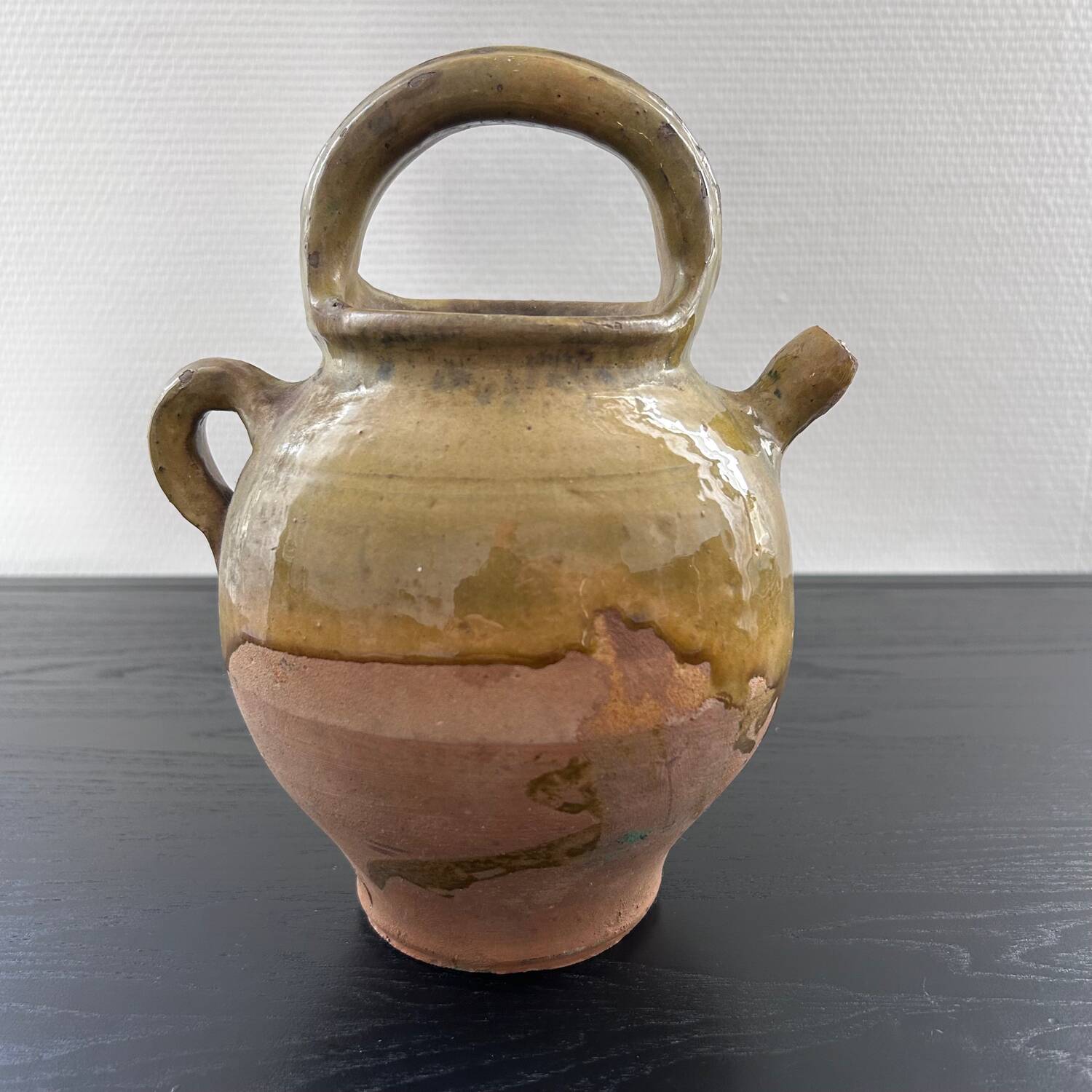 Antique two-material water jug