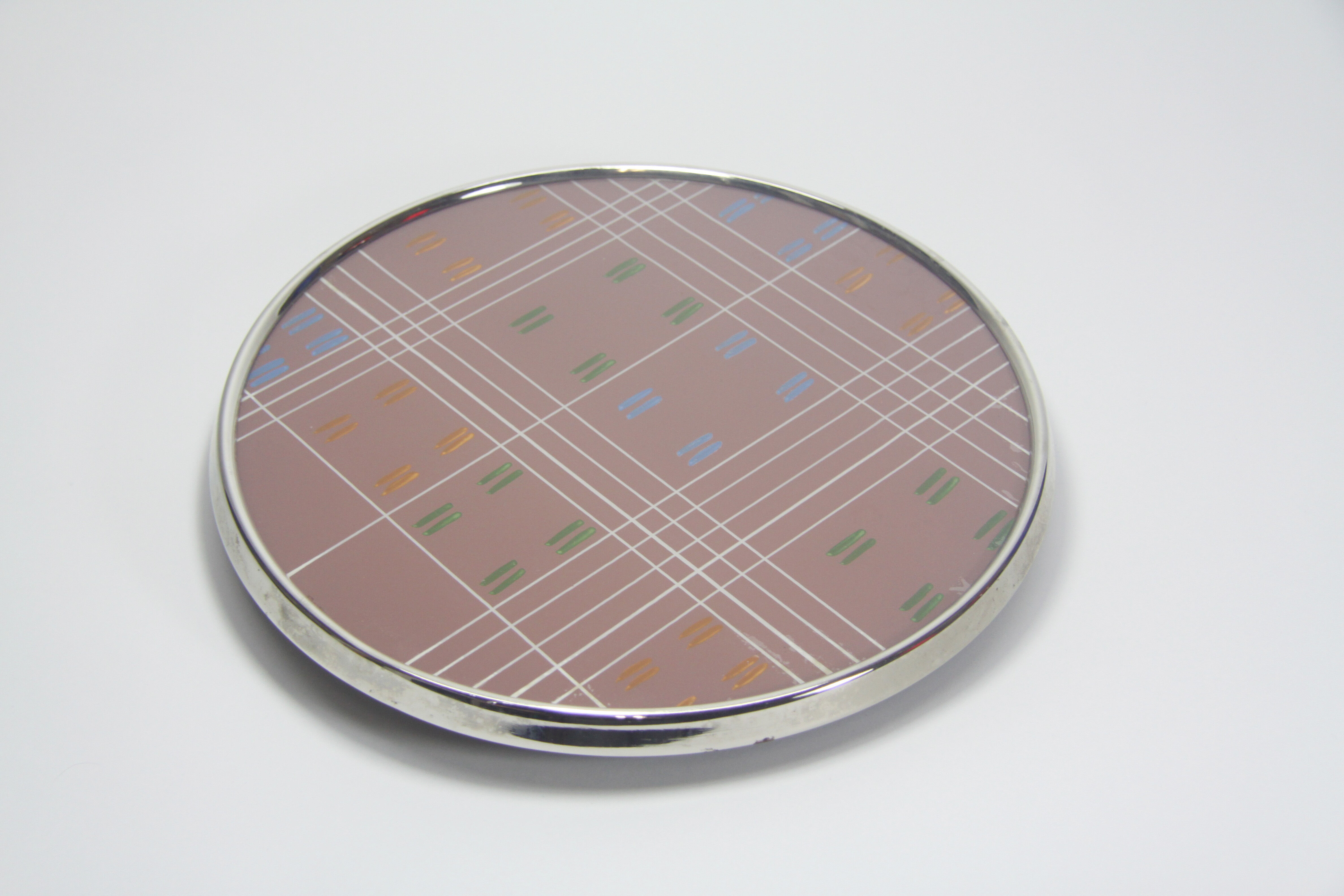 Rotary tray with painted glass