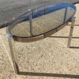 Elliptical coffee table circa 1970 in chromed metal and smoked glass