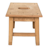 Small low wooden stool