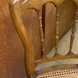 Antique wooden chair, cane seat