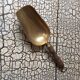 Old brass grocer's shovel or seed