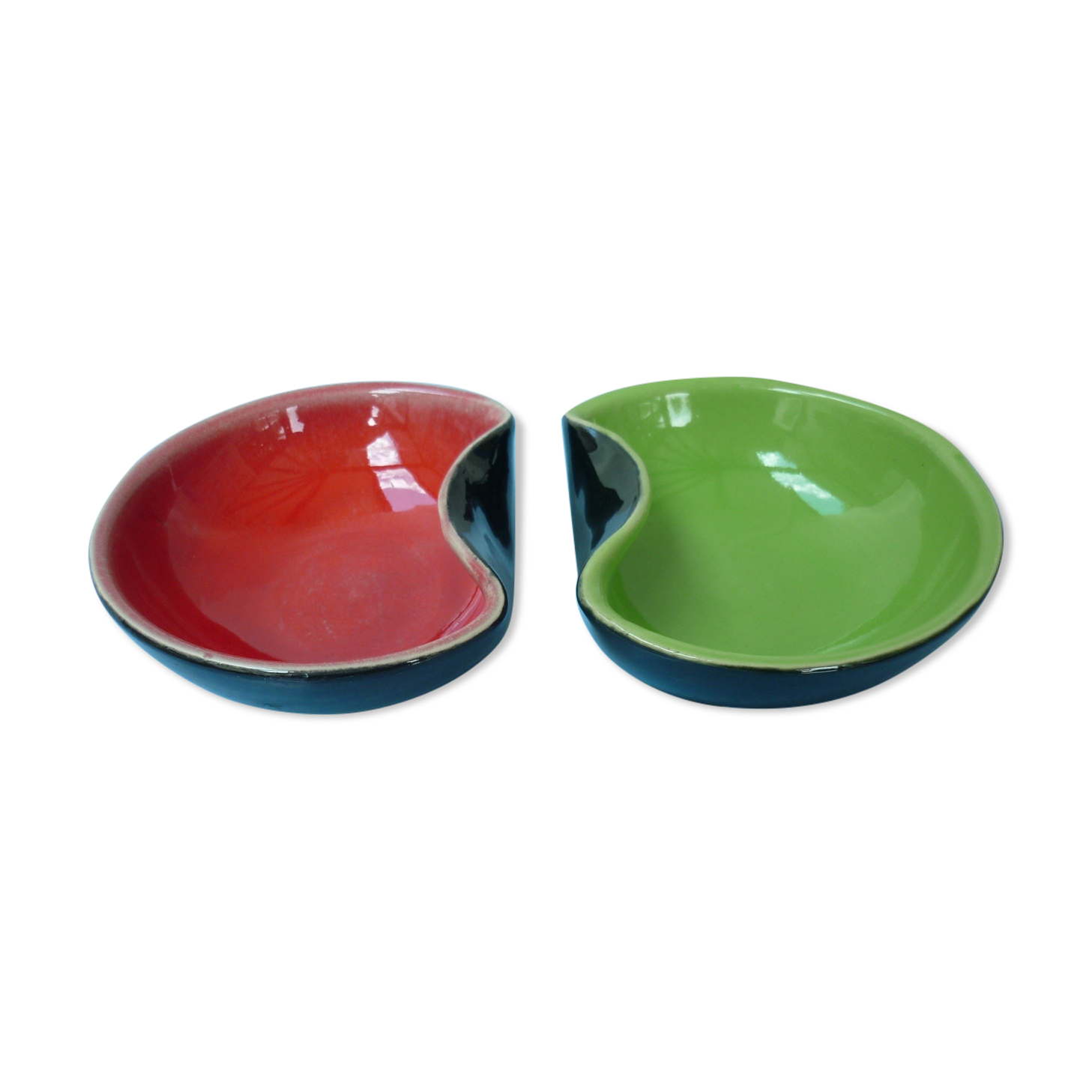 Set of two-colored red and green ceramic cuts on a black background