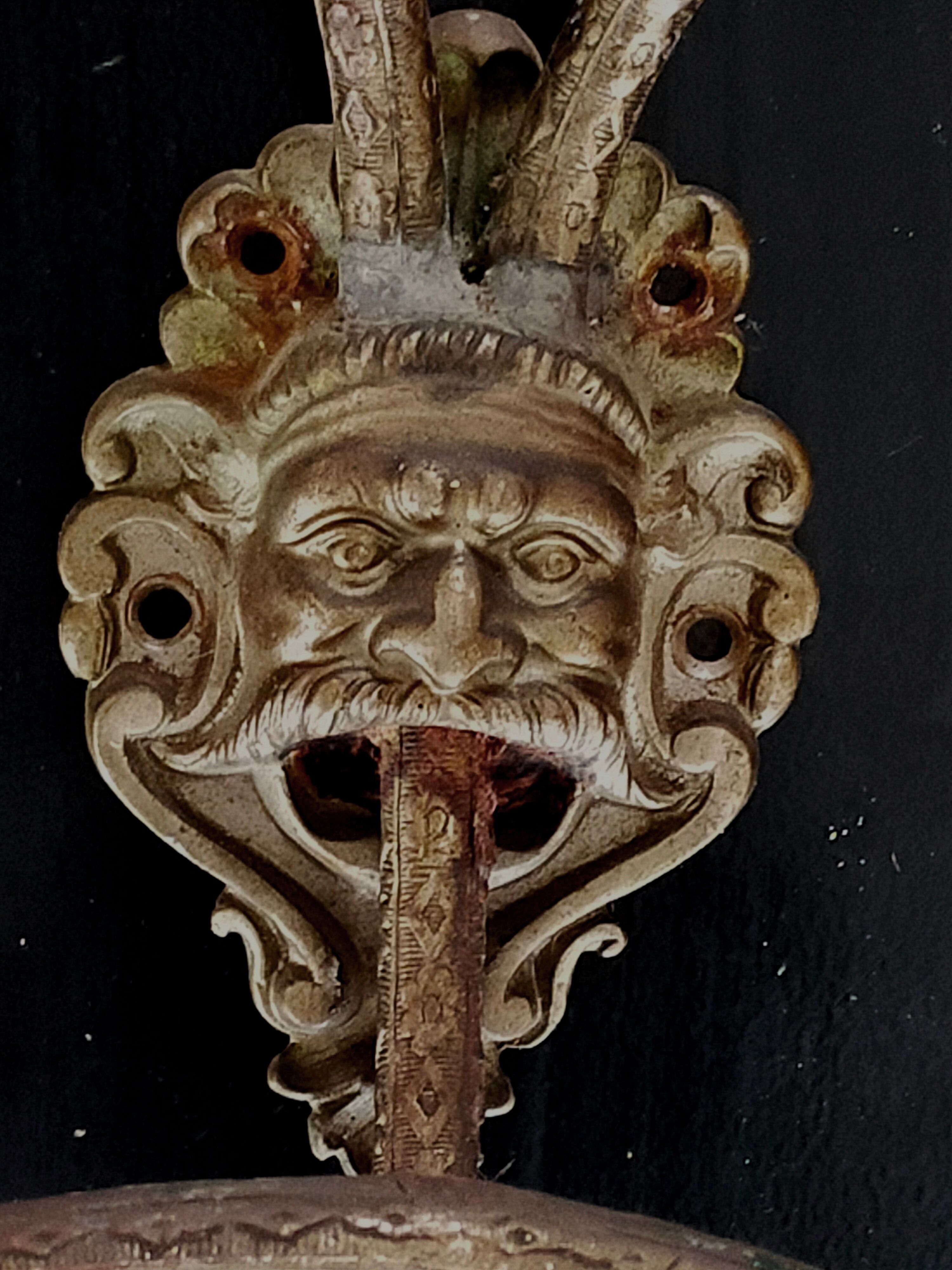 Set of 4 bronze mascaron hooks