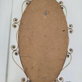 Oval mirror in gilded brass and floral horn, 1950s