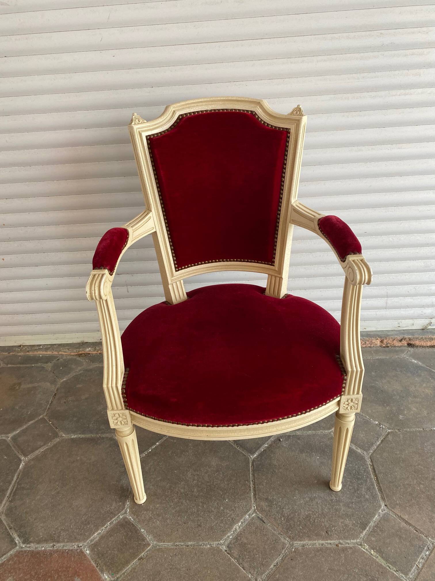 PAIR OF LOUIS XVI STYLE CABRIOLET ARMCHAIRS IN STUDDED RED VELVET FABRIC
