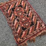 Small handmade Persian rug