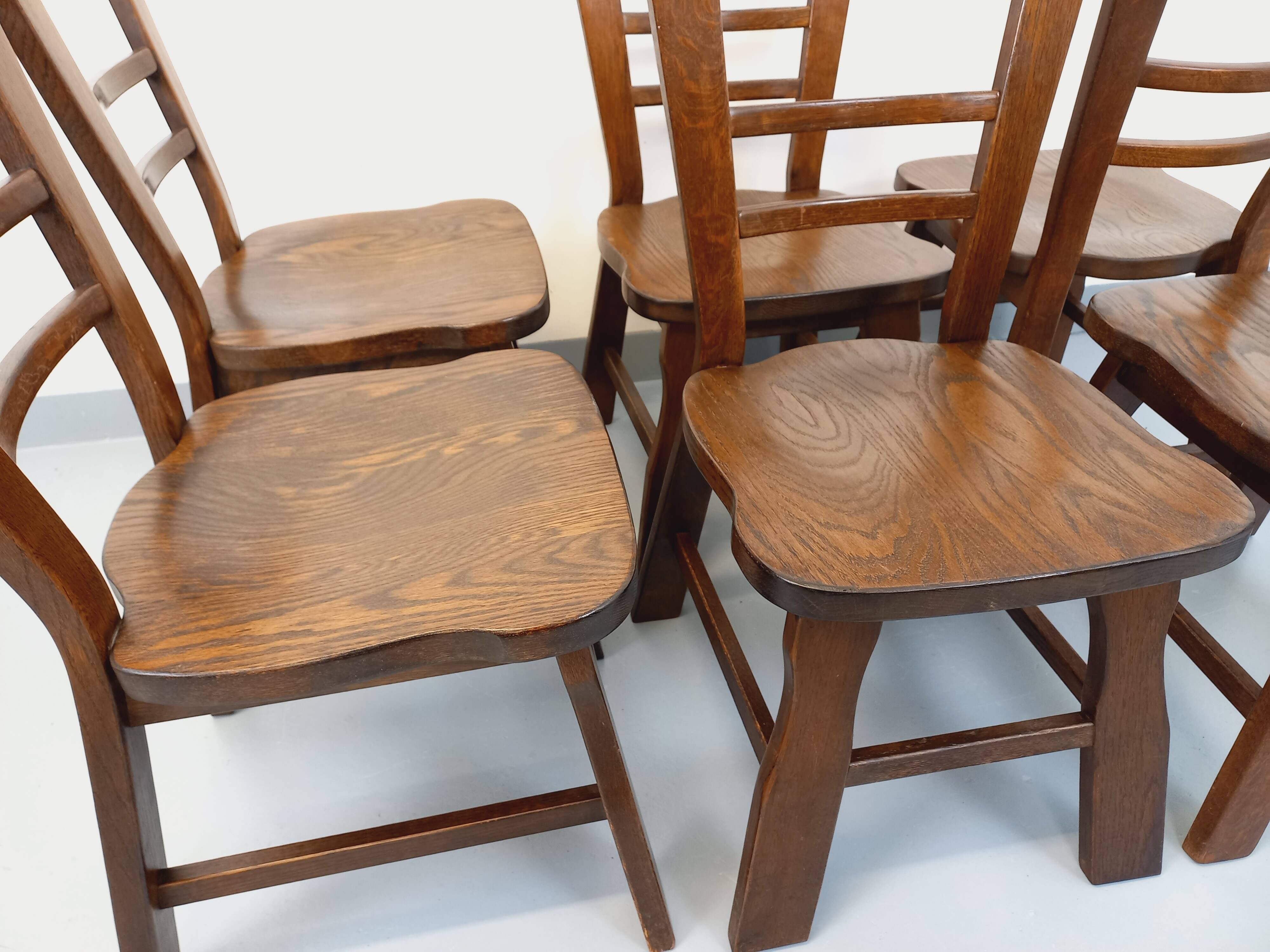Set of 6 vintage brutalist oak chairs from the 1950s.