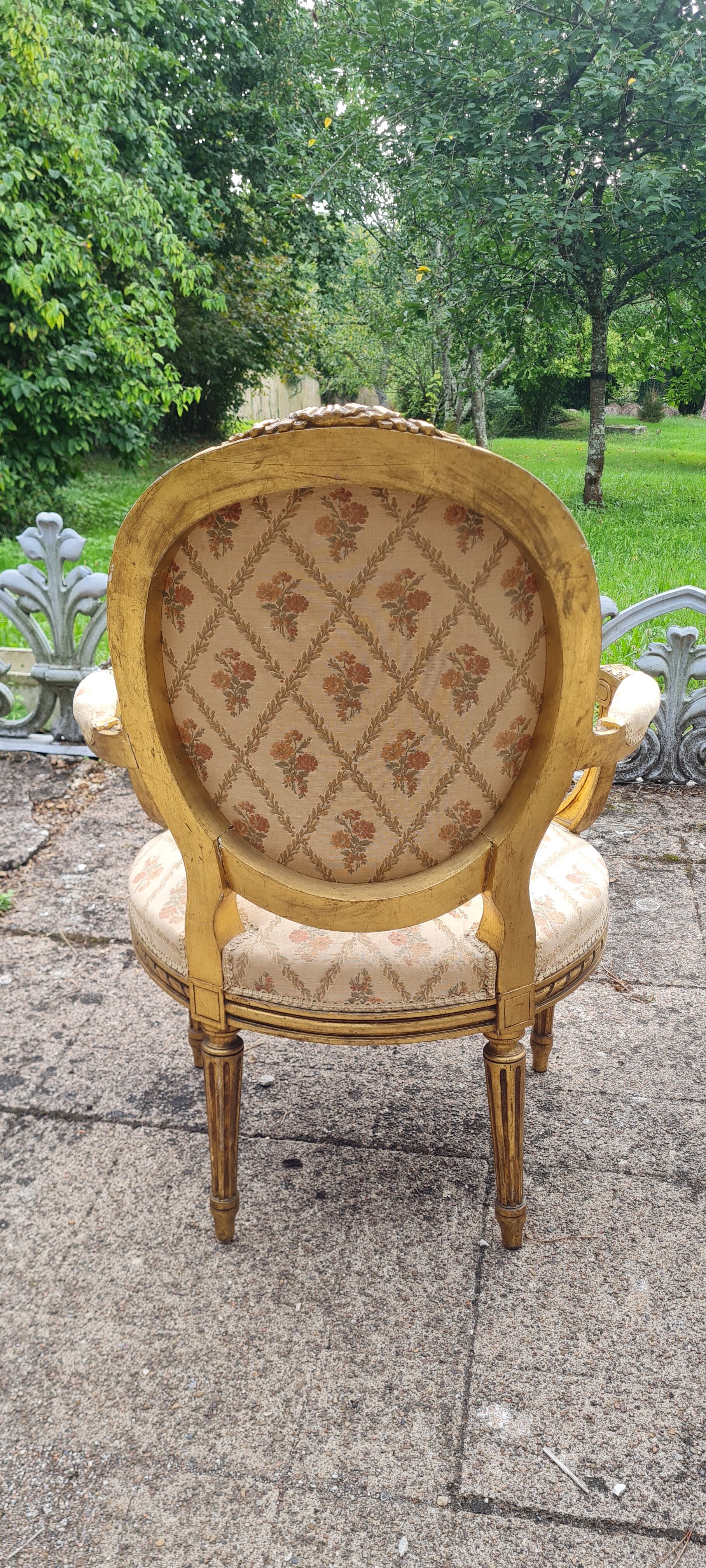 Pair of armchairs medallion in gilded wood Louis XVI style