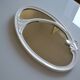 Oval mirror in art nouveau jugendstil style in enamelled cast iron 49 x 29