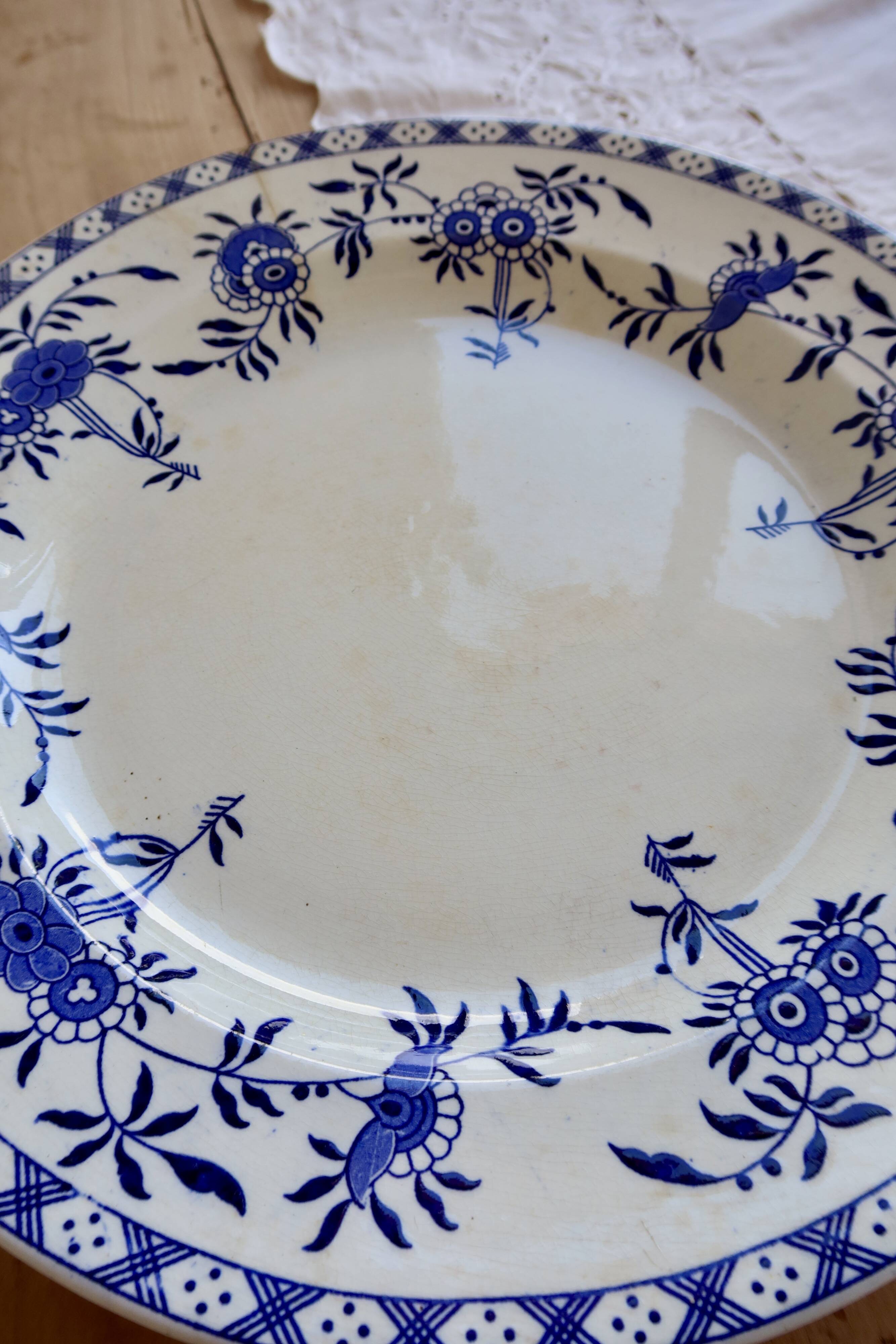 Large round antique plate, blue and white Dresden porcelain.