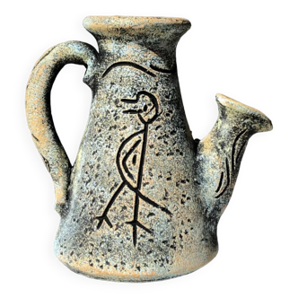 Stoneware pitcher with abstract bird motif