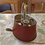 Old silver-plated bronze lamp, except for the arms which are not silver.