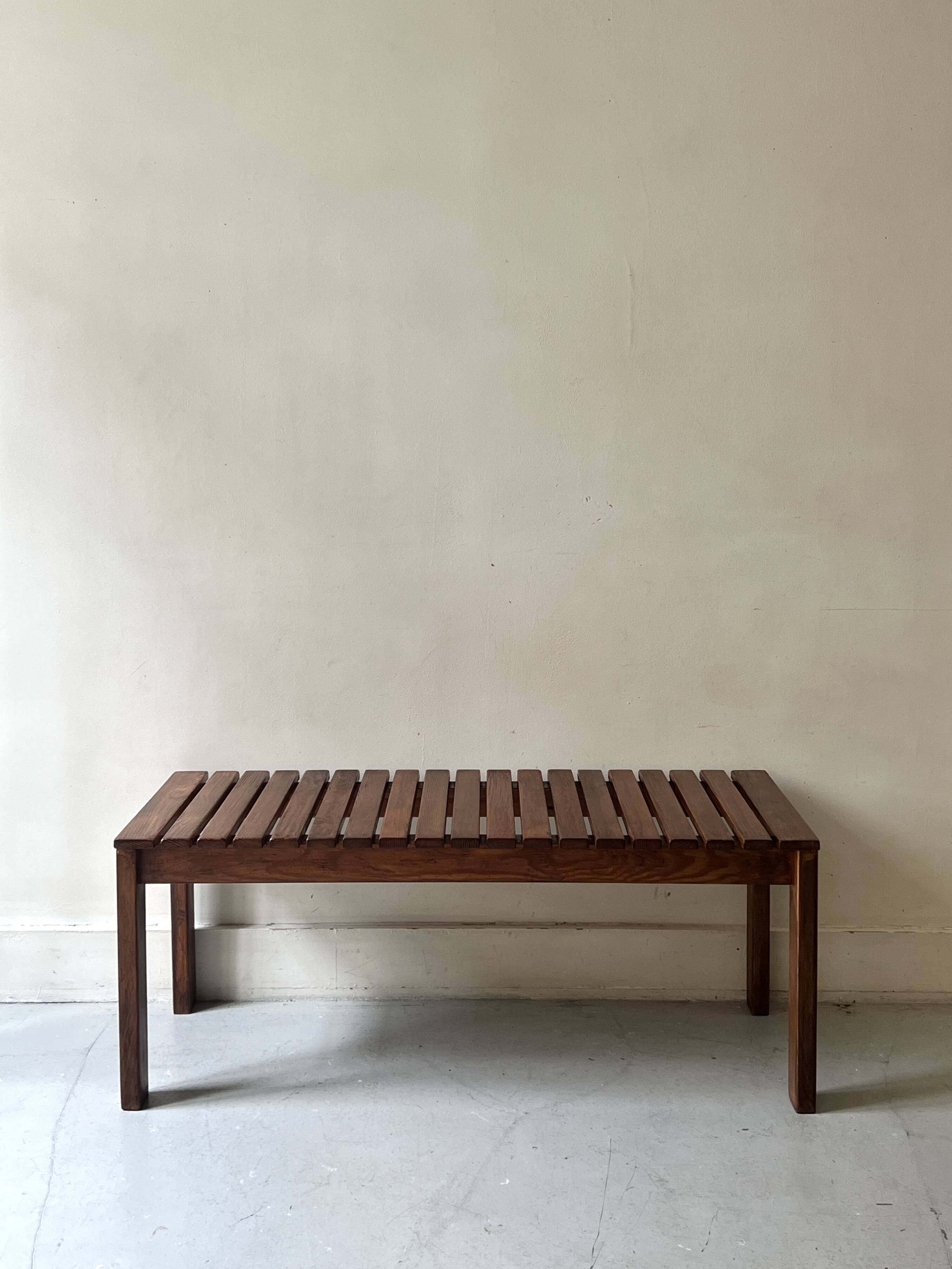Bench / modernist coffee table made of wooden slats, 1970s design.