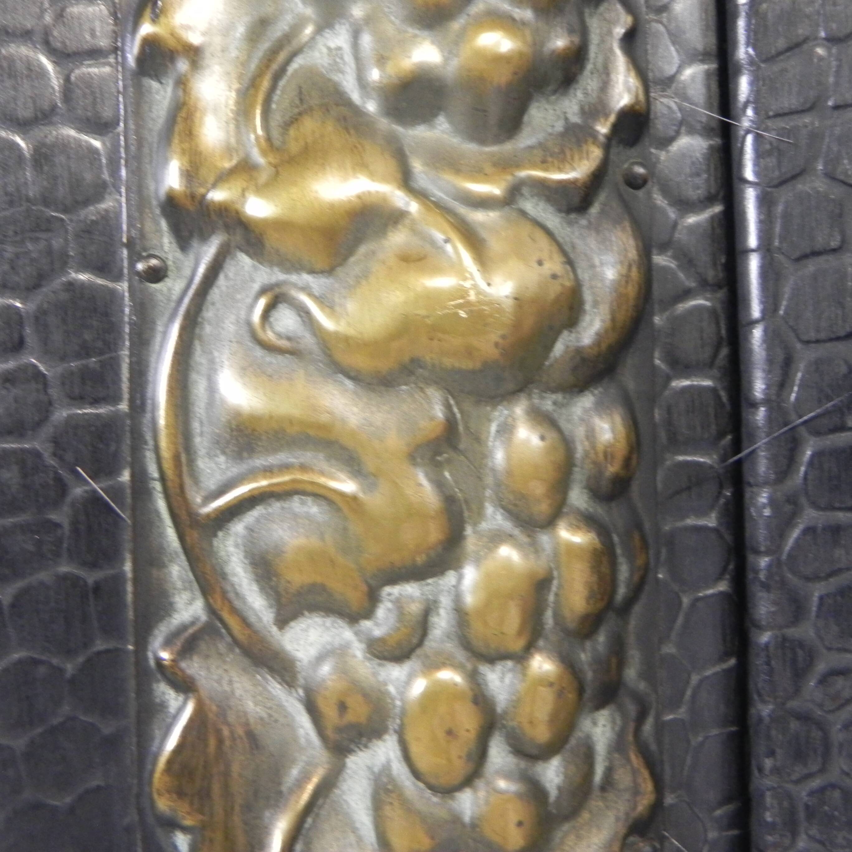 Art Deco screen in steel with brass details, 1930s.