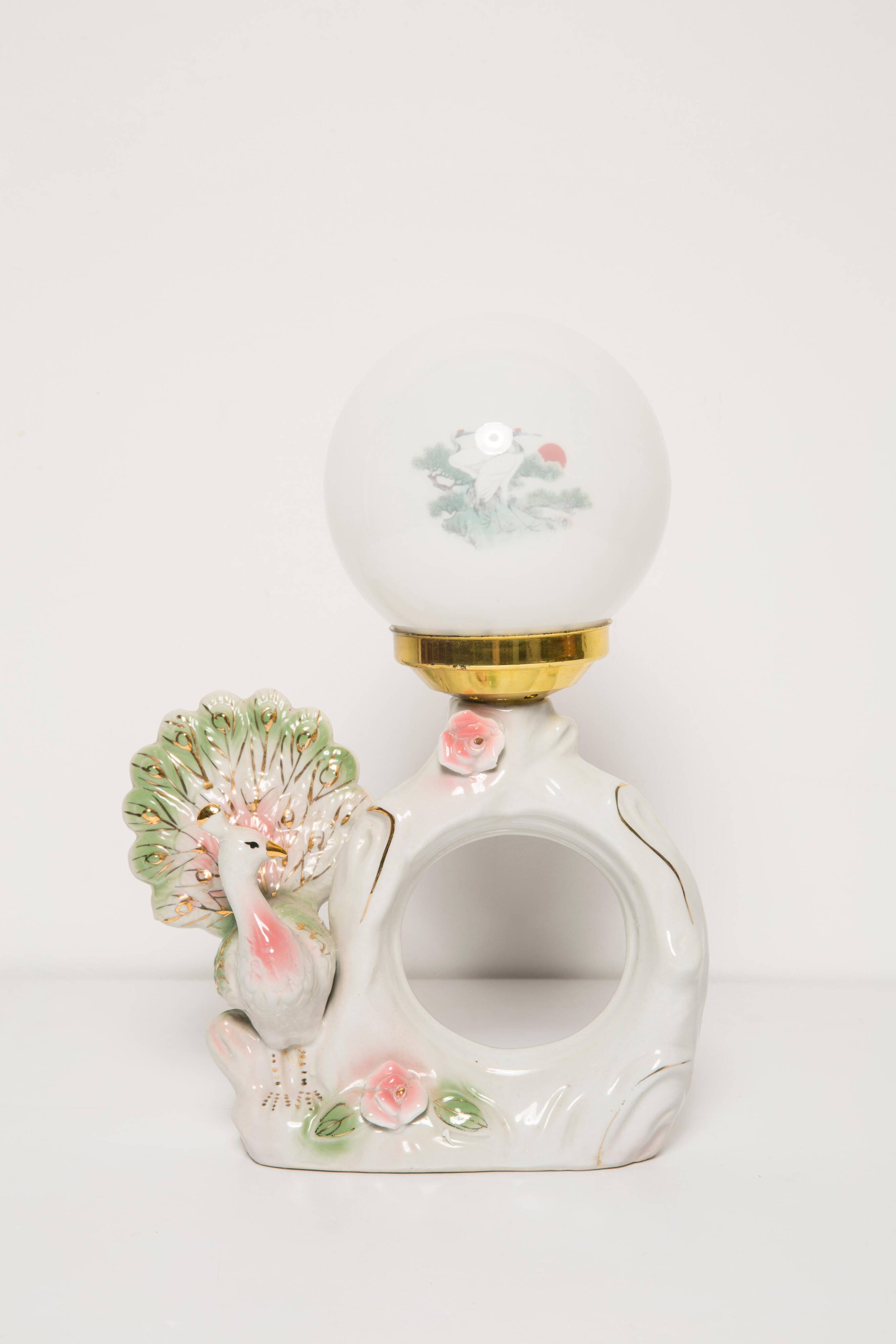 Mid-century white ceramic peacock table lamp, Europe, 1960s.