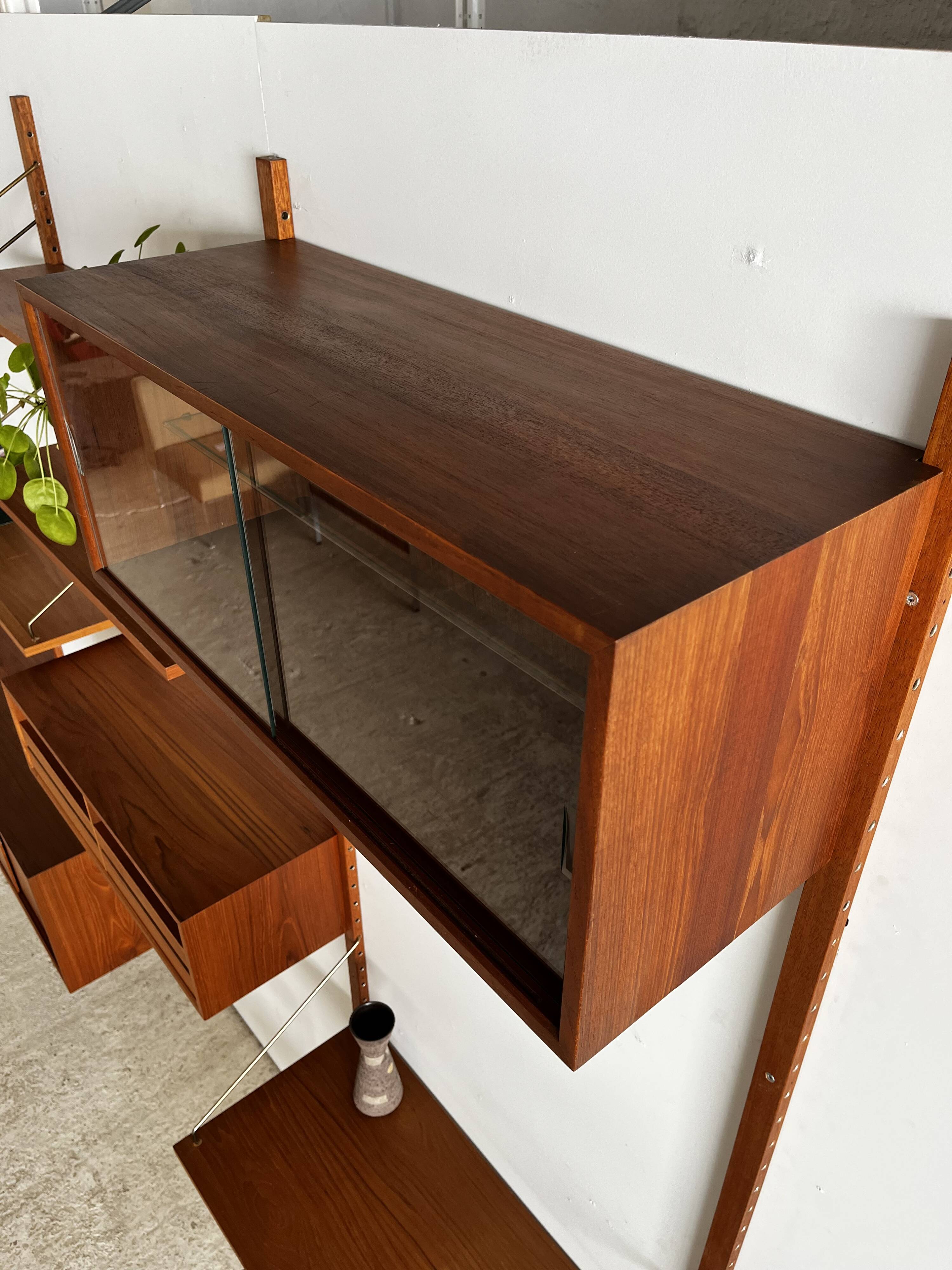 A wall unit with 4 compartments by Poul Cadovius, Denmark, 1960s.