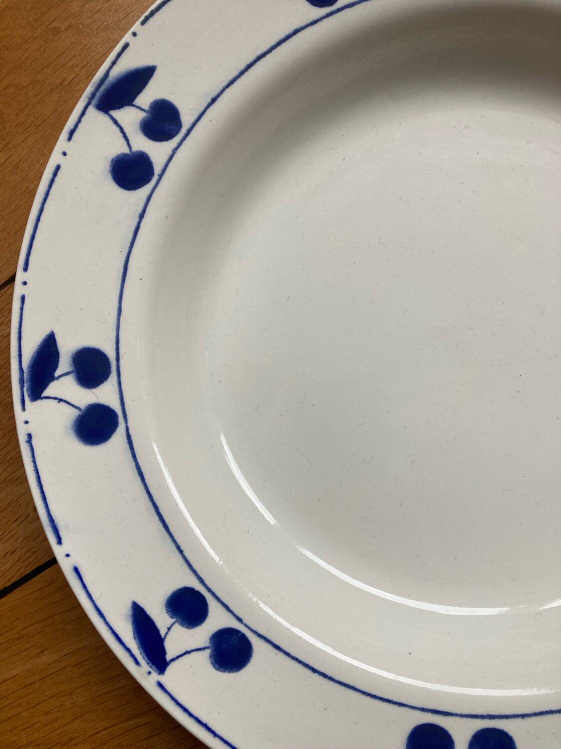 Fruit bowl decorated with blue cherries