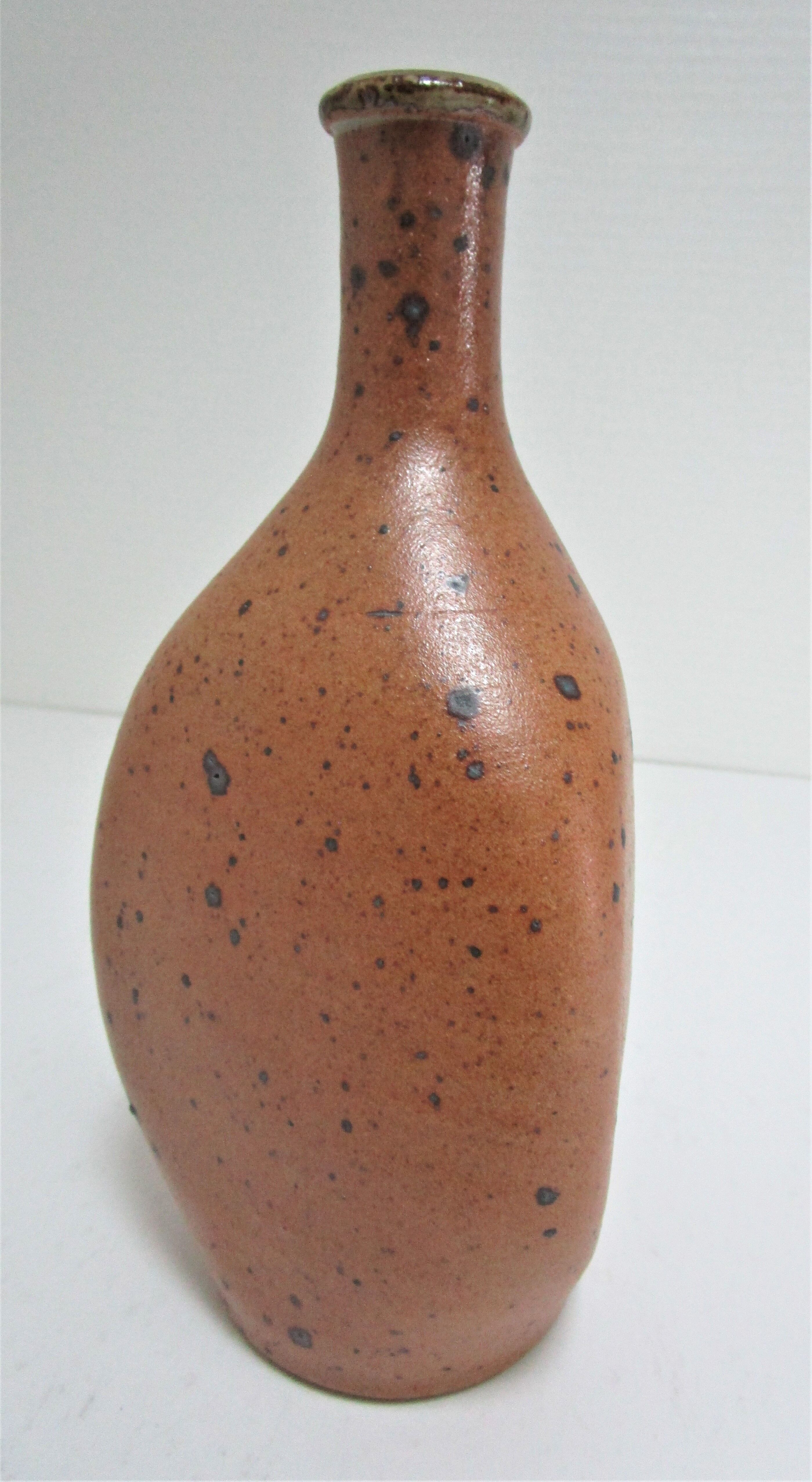 Soliflore vase in pyrite sandstone with three vintage faces