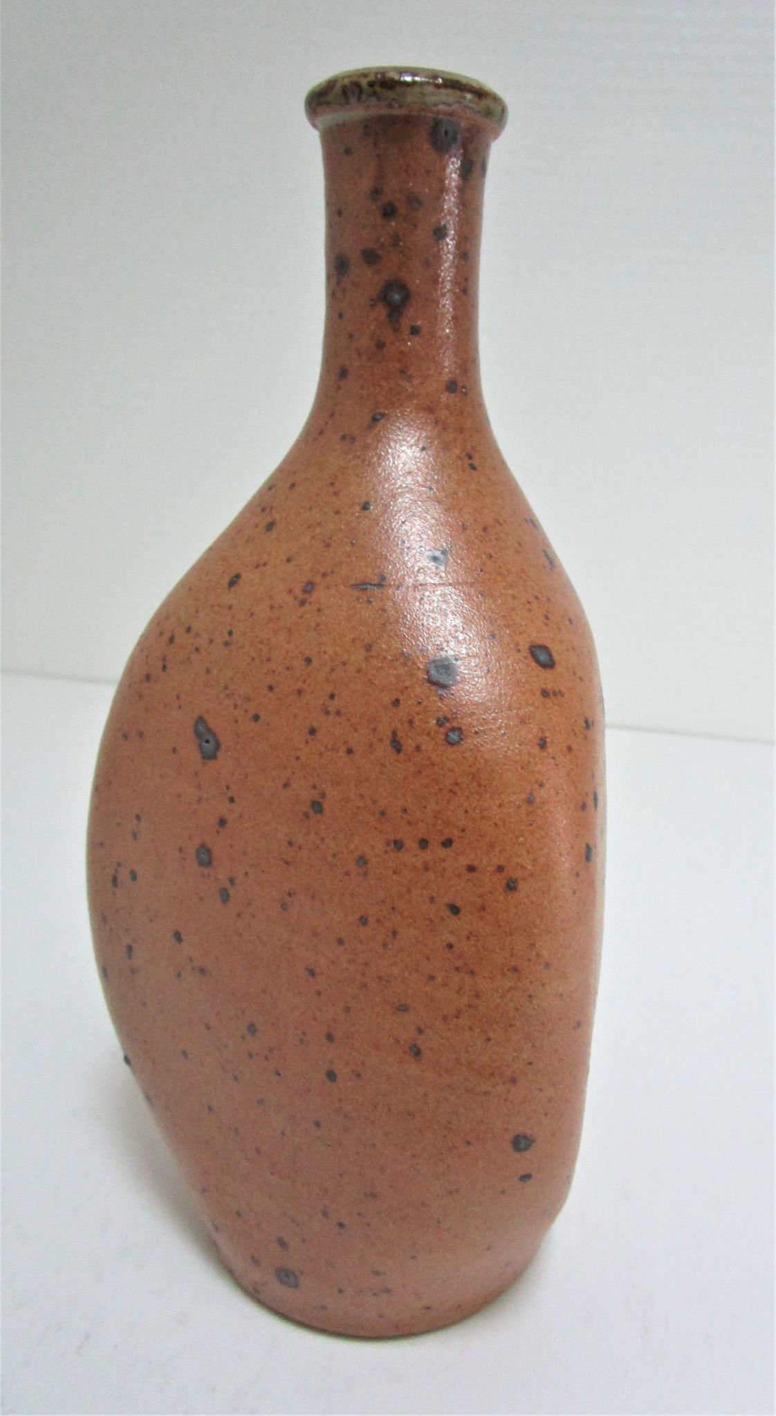 Soliflore vase in pyrite sandstone with three vintage faces