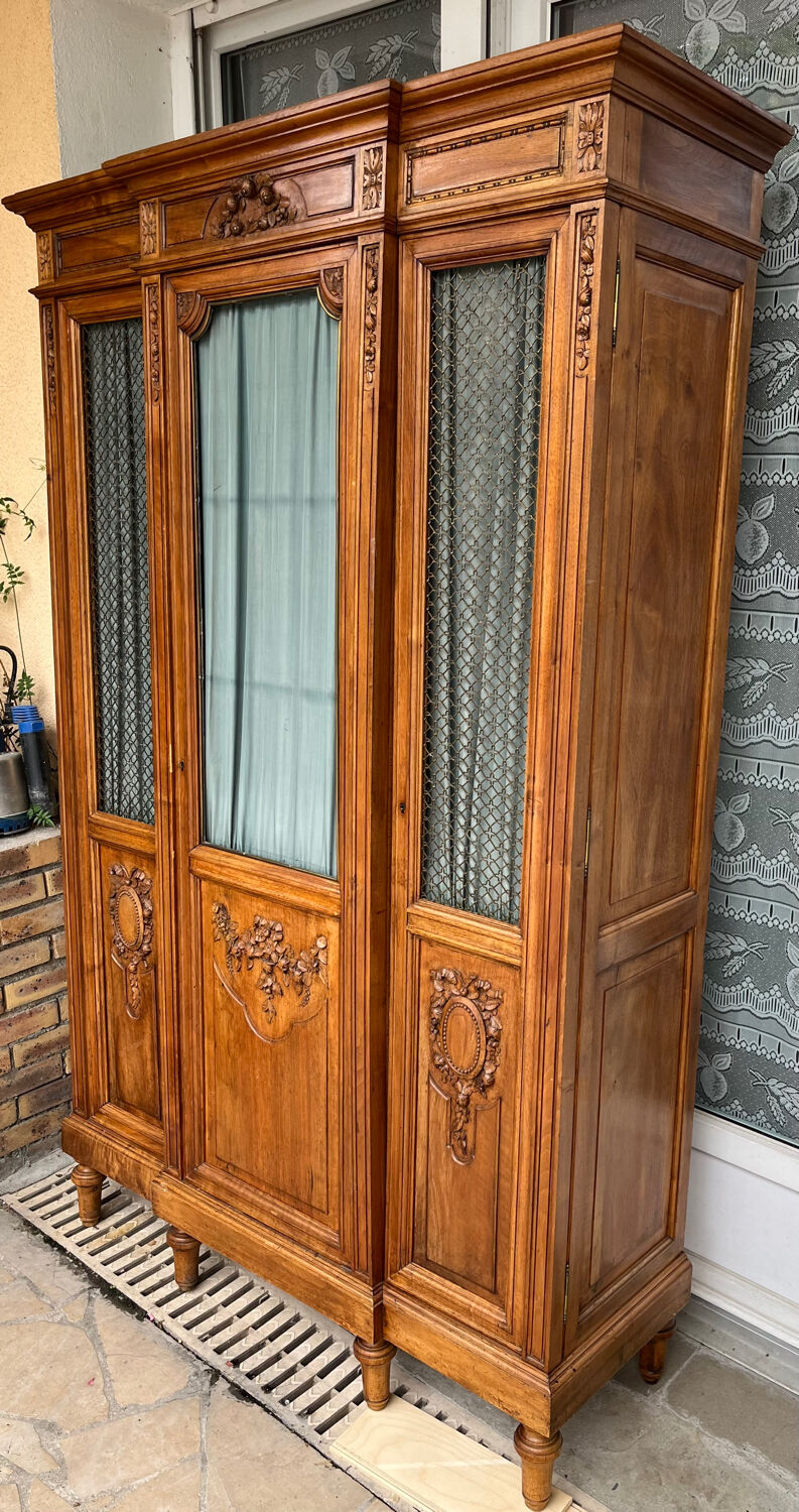 Antique carved wooden bookcase