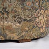 Upholstered pouf in verdure tapestry style, France, late 19th century.