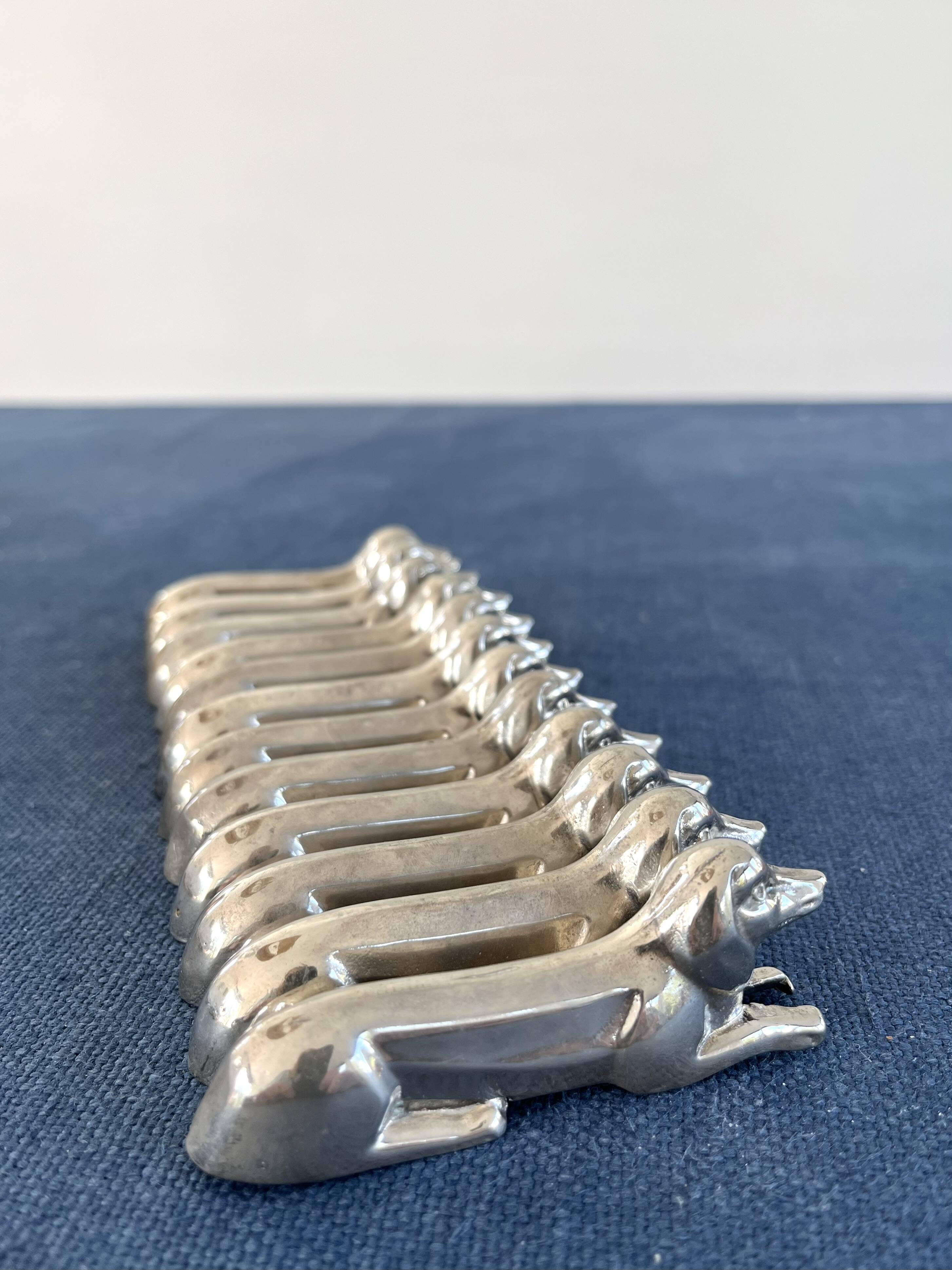 12 metal dachshund knife rests