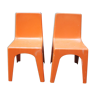 2 old children's chairs in plastic orange 70s