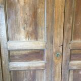 Front of old double door walnut cabinet