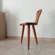 Low brutalist tripod chair in solid oak from the 1960s.