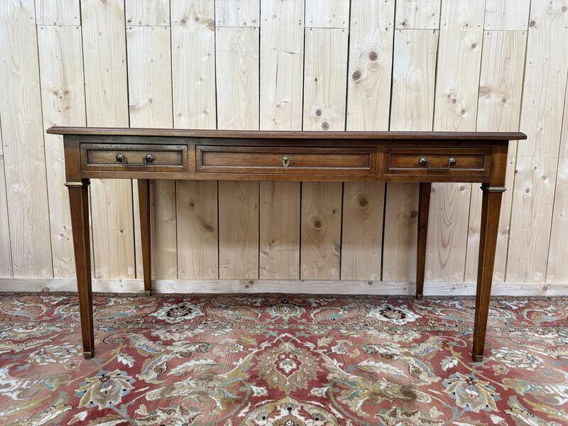 Bureau plat de style Louis XVI en merisier et cuir noir