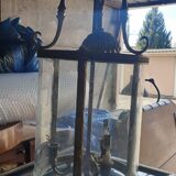 Suspension in glass and brass