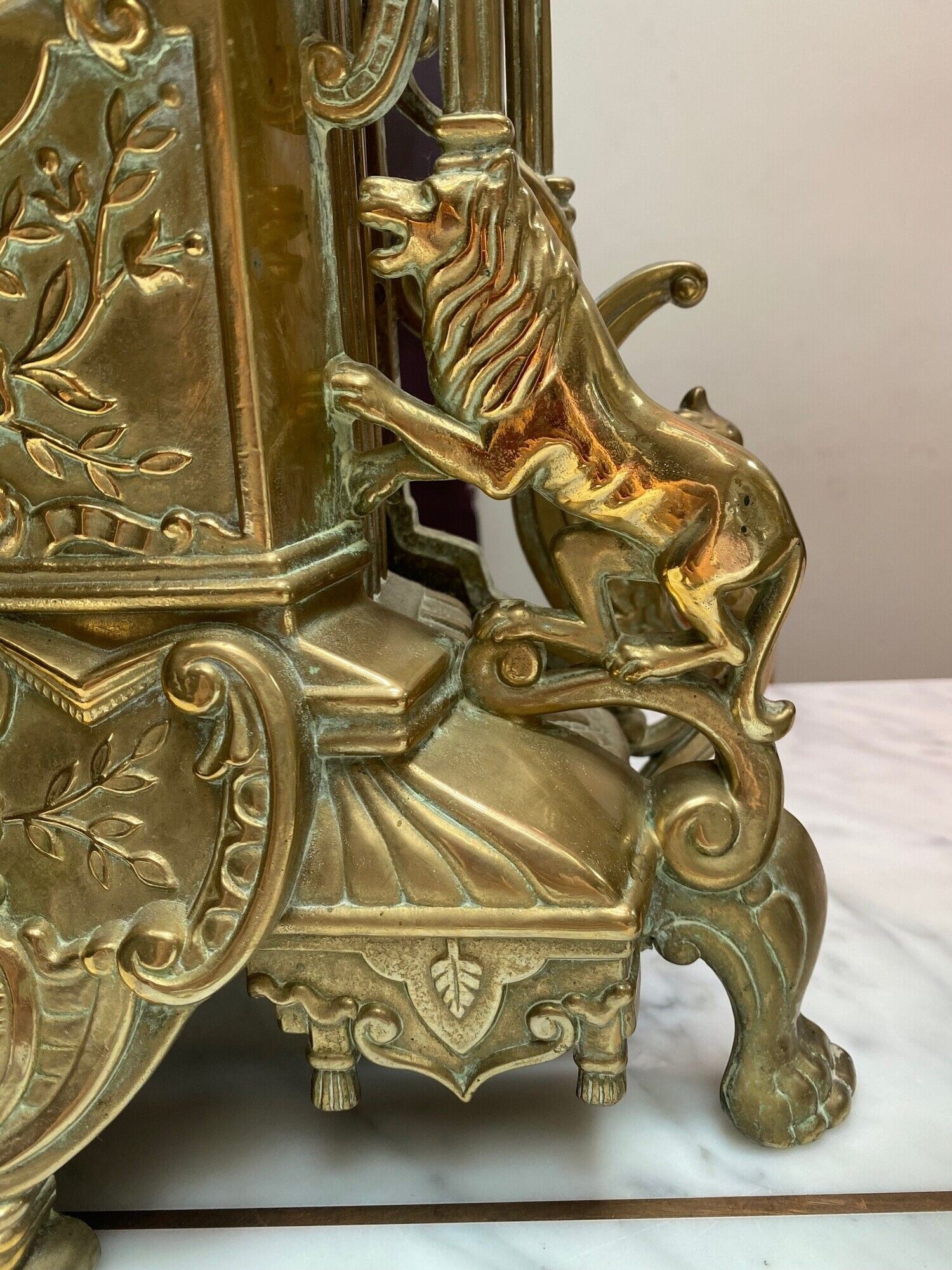 Fireplace trim clock and adornment of antique bronze candelabra