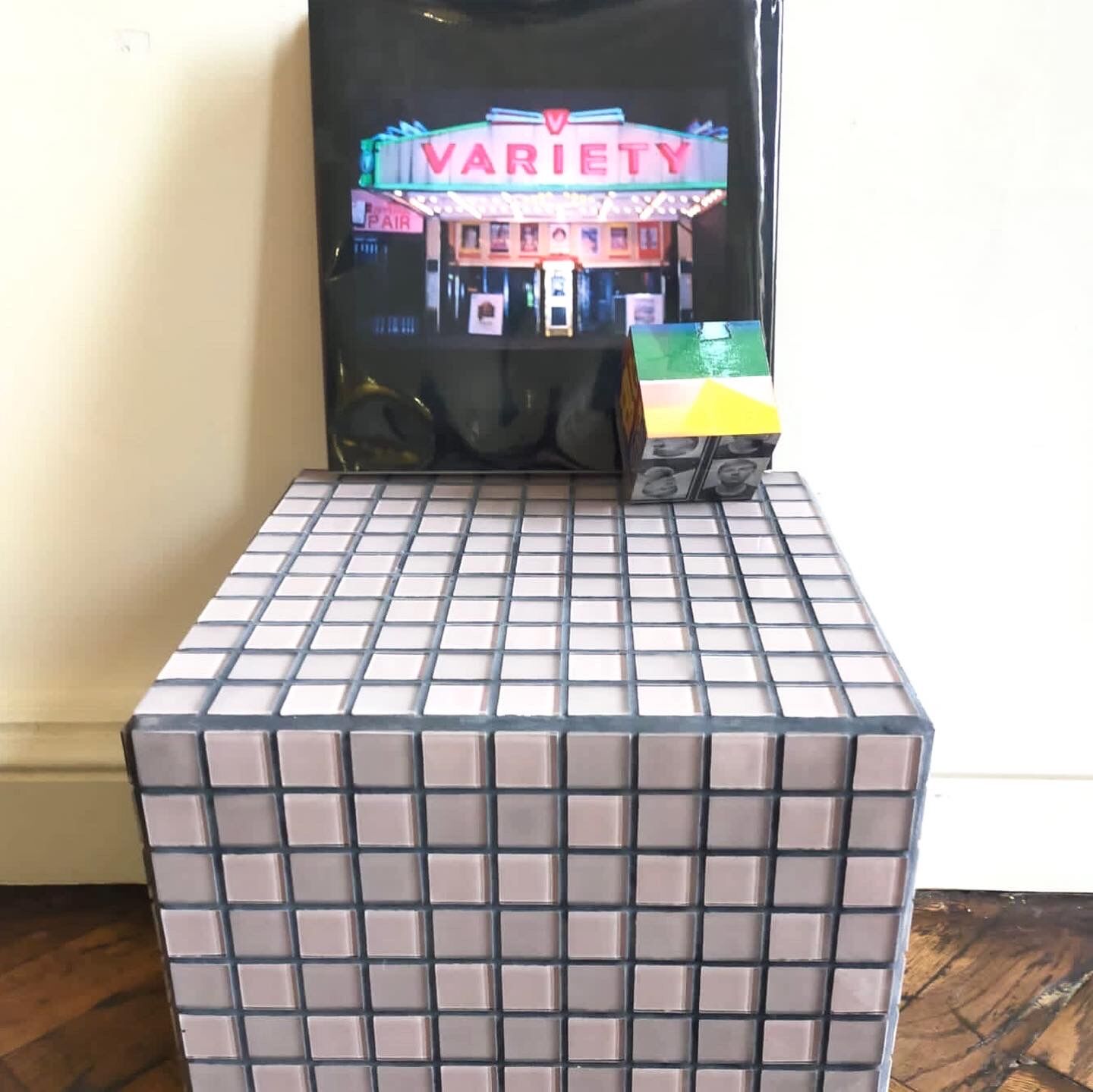 Ceramic tile cube, stool end of sofa