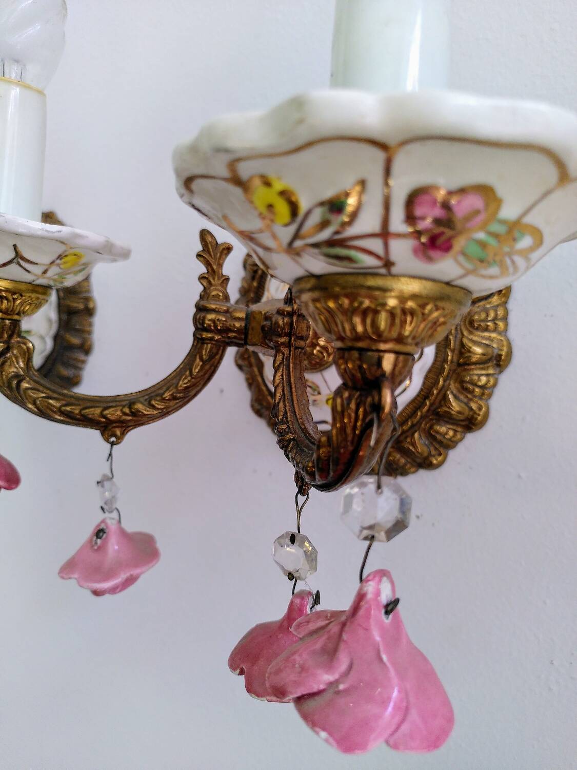 Pair of brass and porcelain wall lights