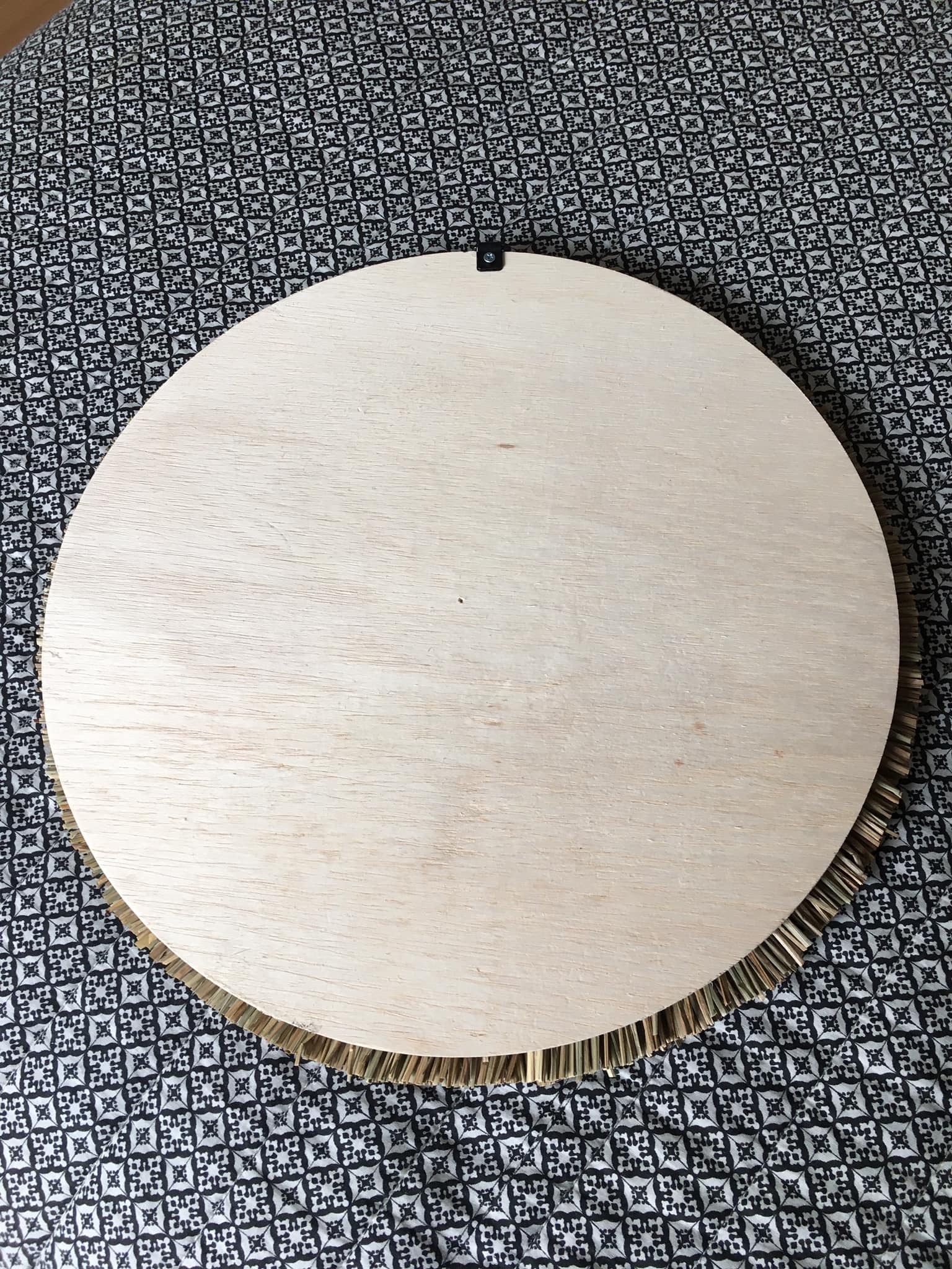 Wall mirror in natural raffia and black cords on wooden support, 37 cm