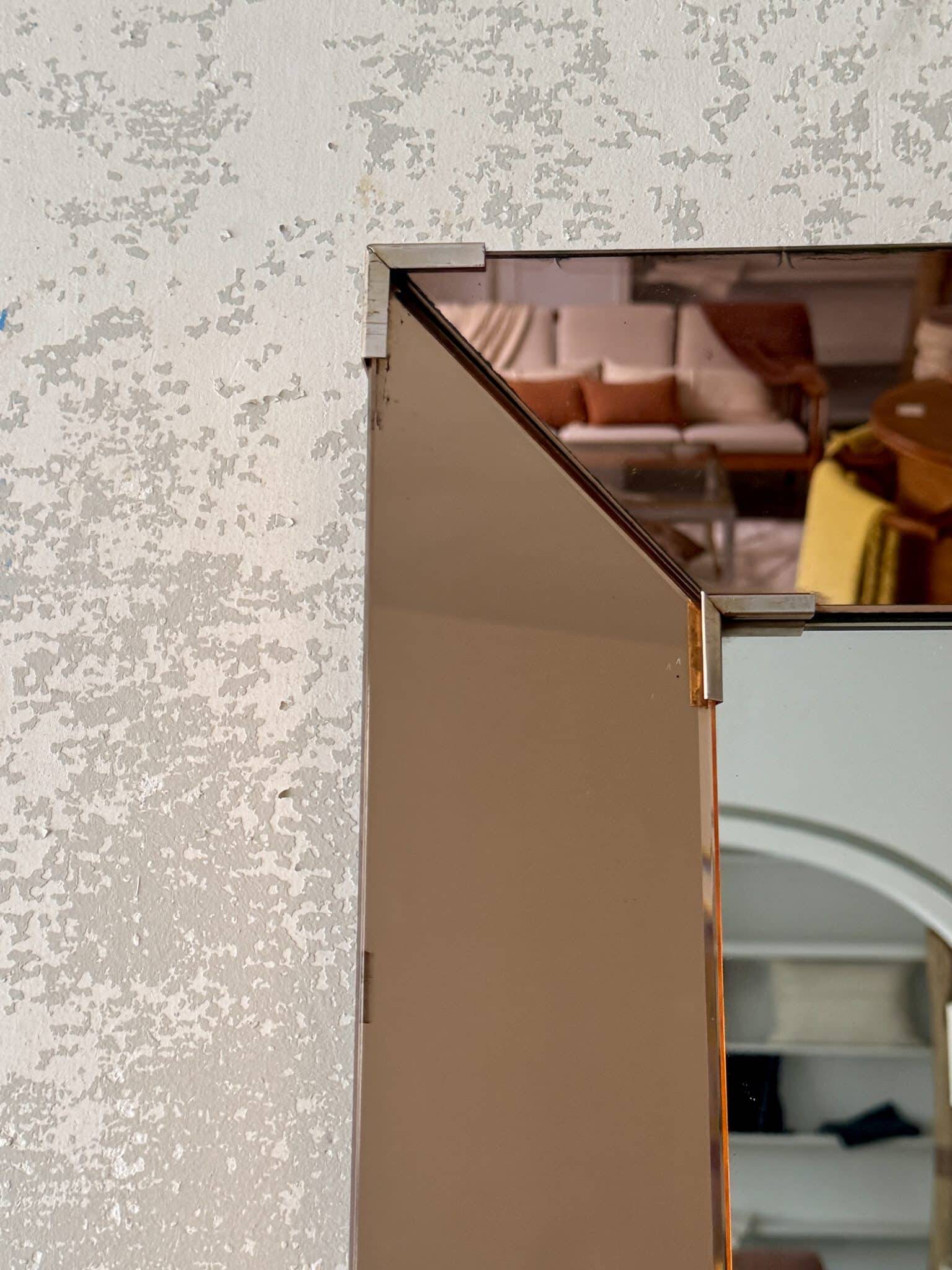 Faceted mirror with rose-coloured frame – Italy, 1980s