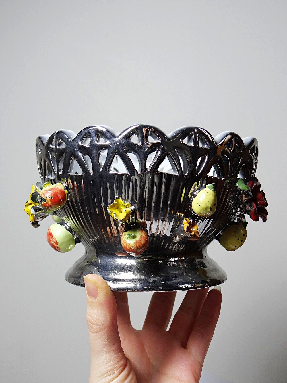 Vintage Italian silver-plated porcelain bowl with cut-out design of fruits and flowers.