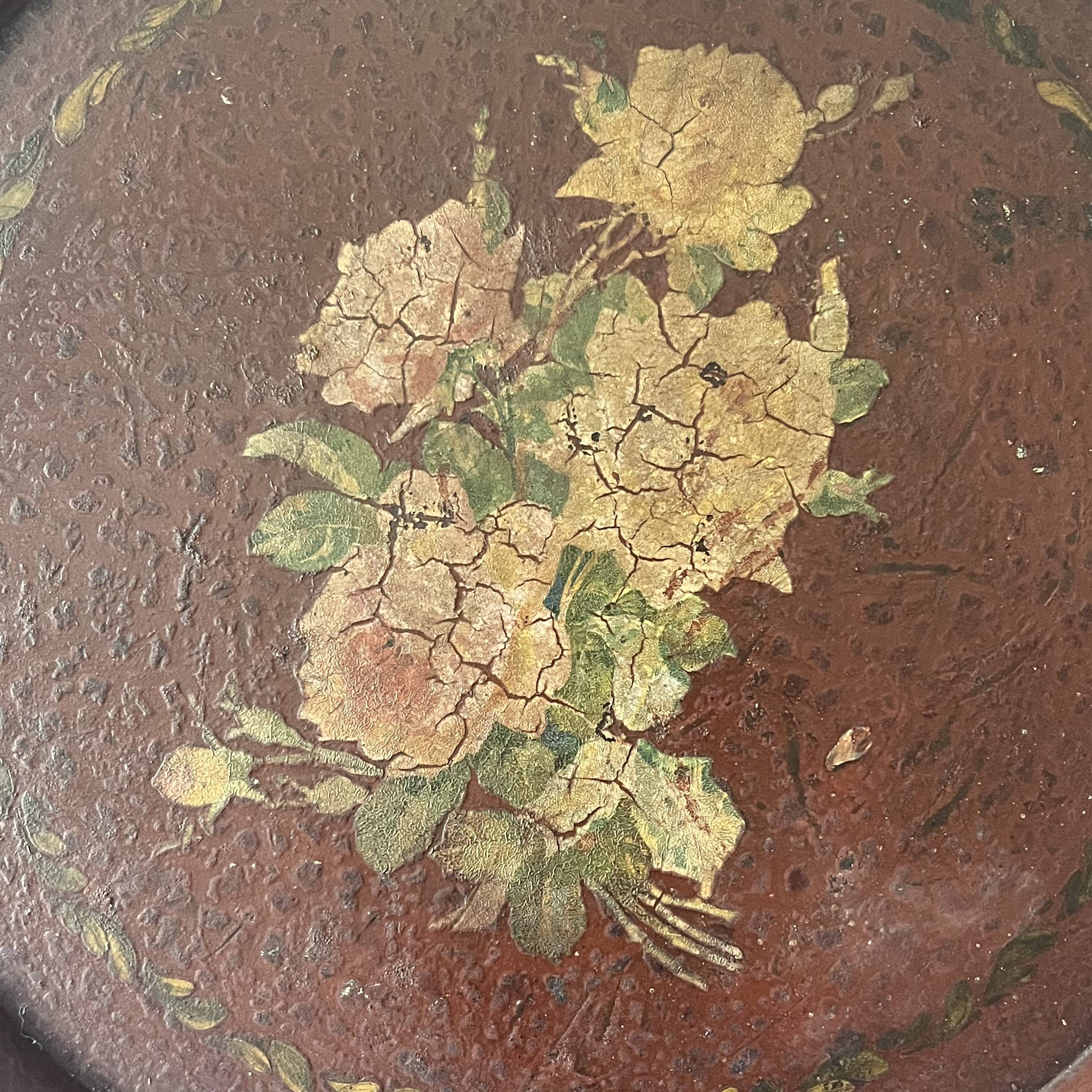 Two old trays on a stand/console.